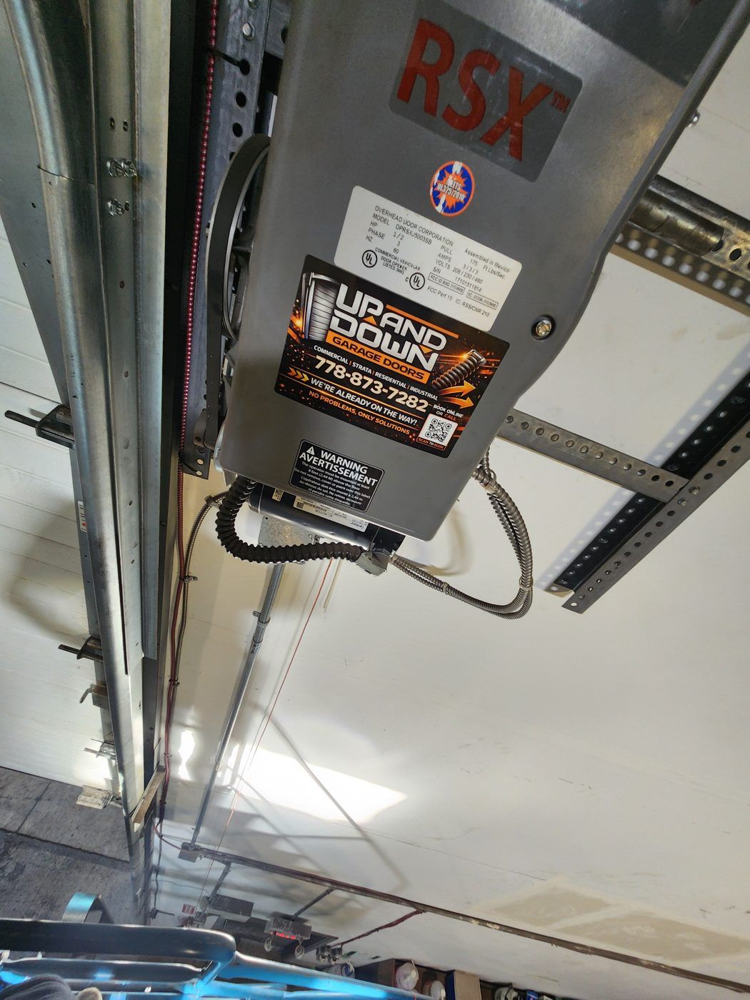 Chamberlain RSX garage door opener control unit installed by Up and Down Garage Doors, Metro Vancouver