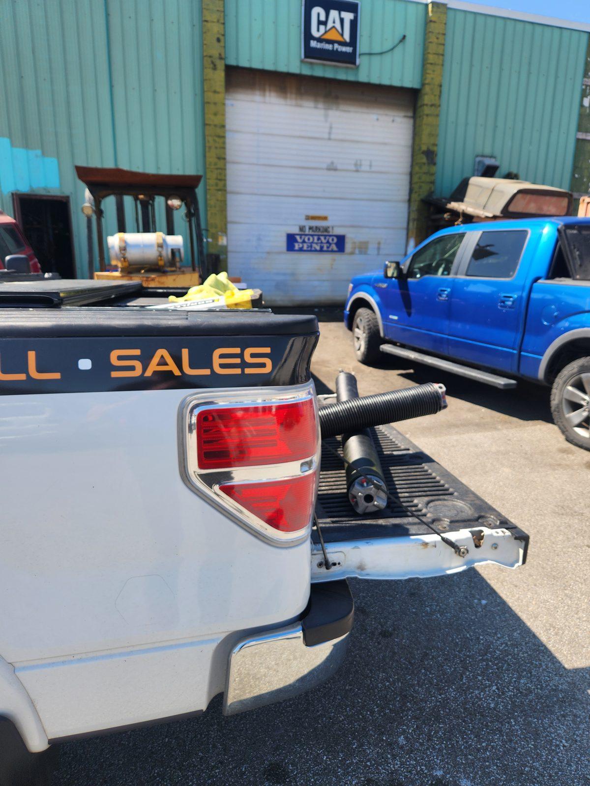 Torsion springs loaded on the service truck at a commercial warehouse