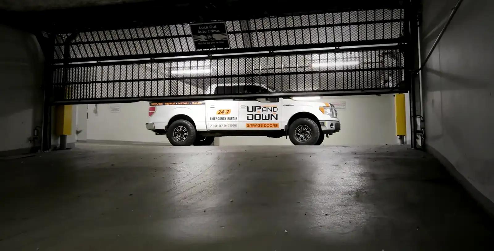 Up and Down Garage Doors truck at a Richmond parkade door job