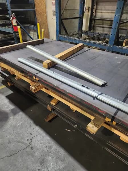 New garage door sections on a rack ready for an installation