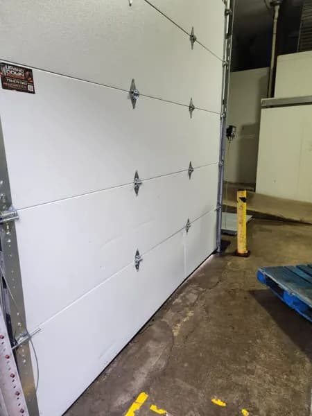 White insulated sectional garage door on a recent job