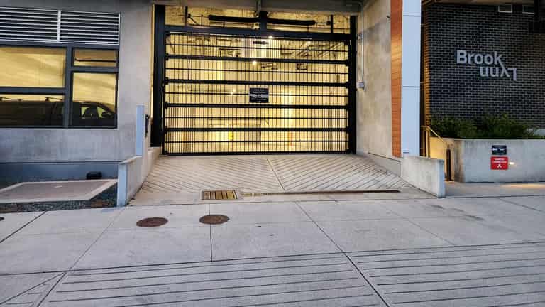 Strata parkade gate serviced by Up & Down Garage Doors in Richmond, BC