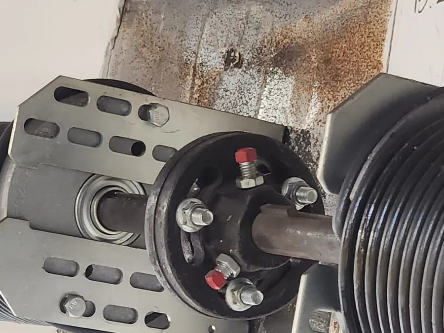 Broken torsion spring — real Up & Down job photo