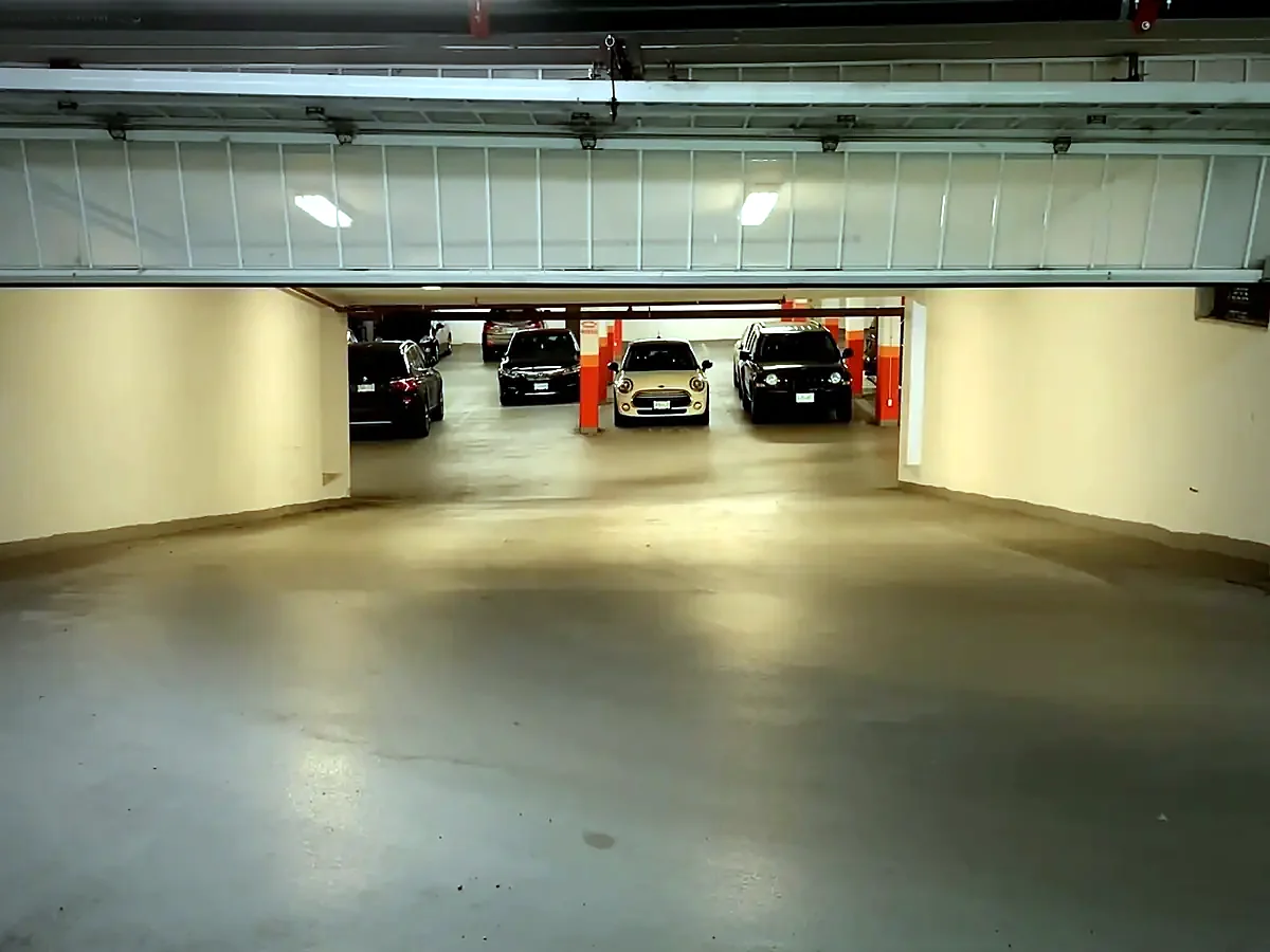 Overhead parkade gate, open & tested — Strata parkade, Up & Down Garage Doors job