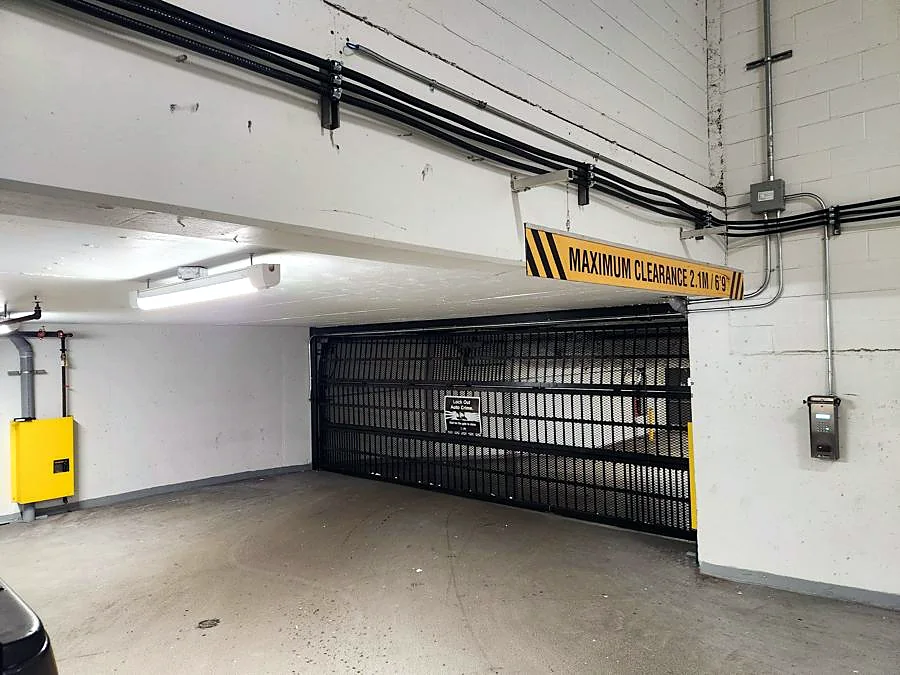 Parkade gate & operator service — Strata parkade, Up & Down Garage Doors job