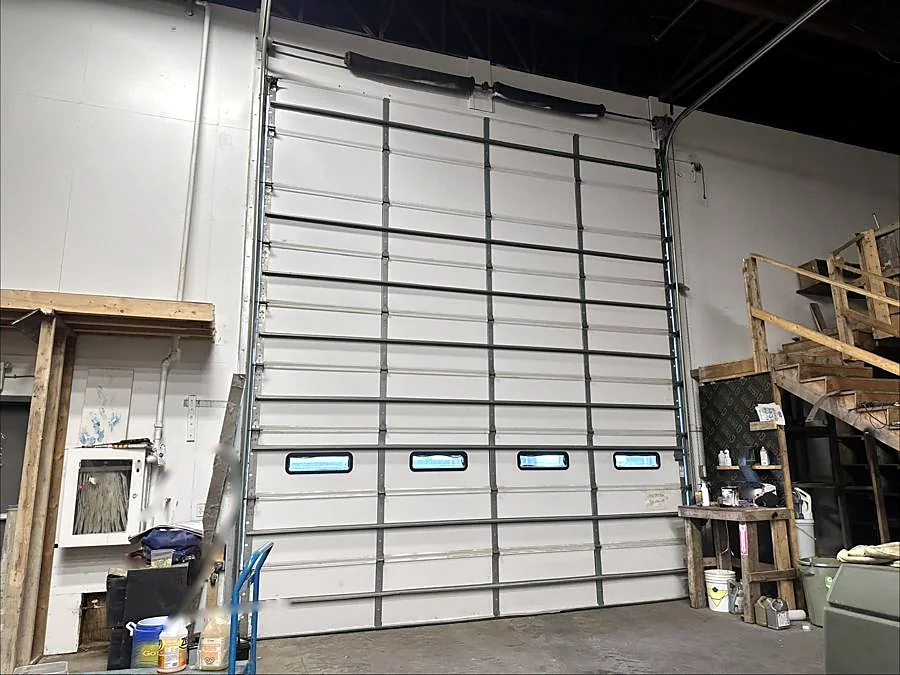 High-lift commercial sectional — Warehouse, Up & Down Garage Doors job