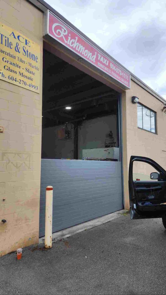 garage door installation of a commercial door for richmondtaxi.ca
